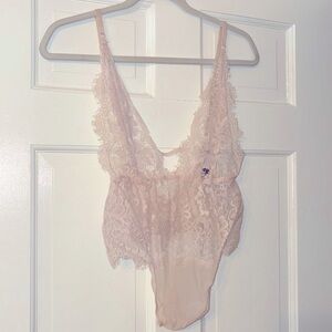 Adore me light pink unlined thing bodysuit lingerie size medium